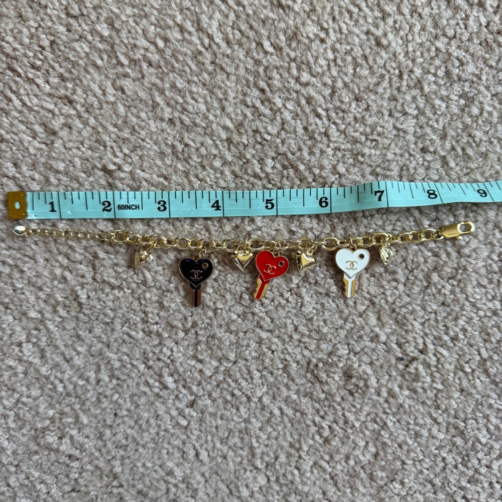 Upcycled Chanel Gold Charm Bracelet with Black, Red, and White Heart Key Charms